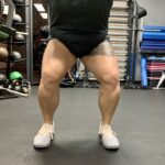 Someone squatting with parallel feet